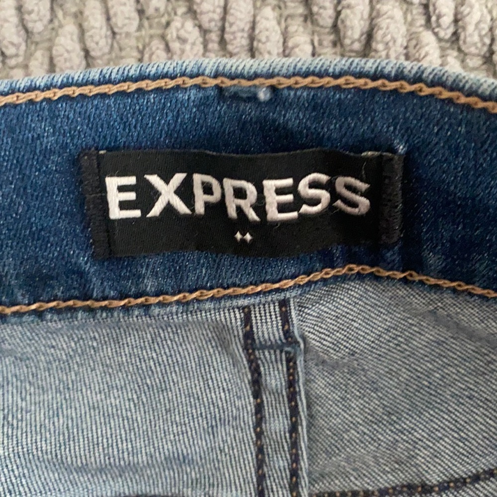Express jeans/jeggings size 0 pink stitching